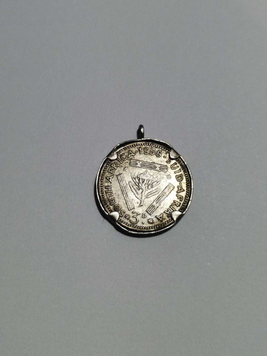1958 SILVER TICKEY / 3P PENDANT IN 925 SILVER SETTING.