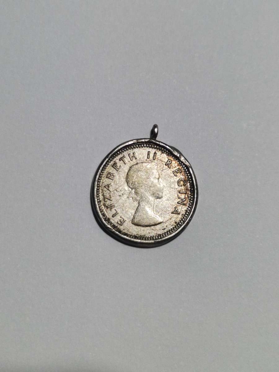 1958 SILVER TICKEY / 3P PENDANT IN 925 SILVER SETTING.