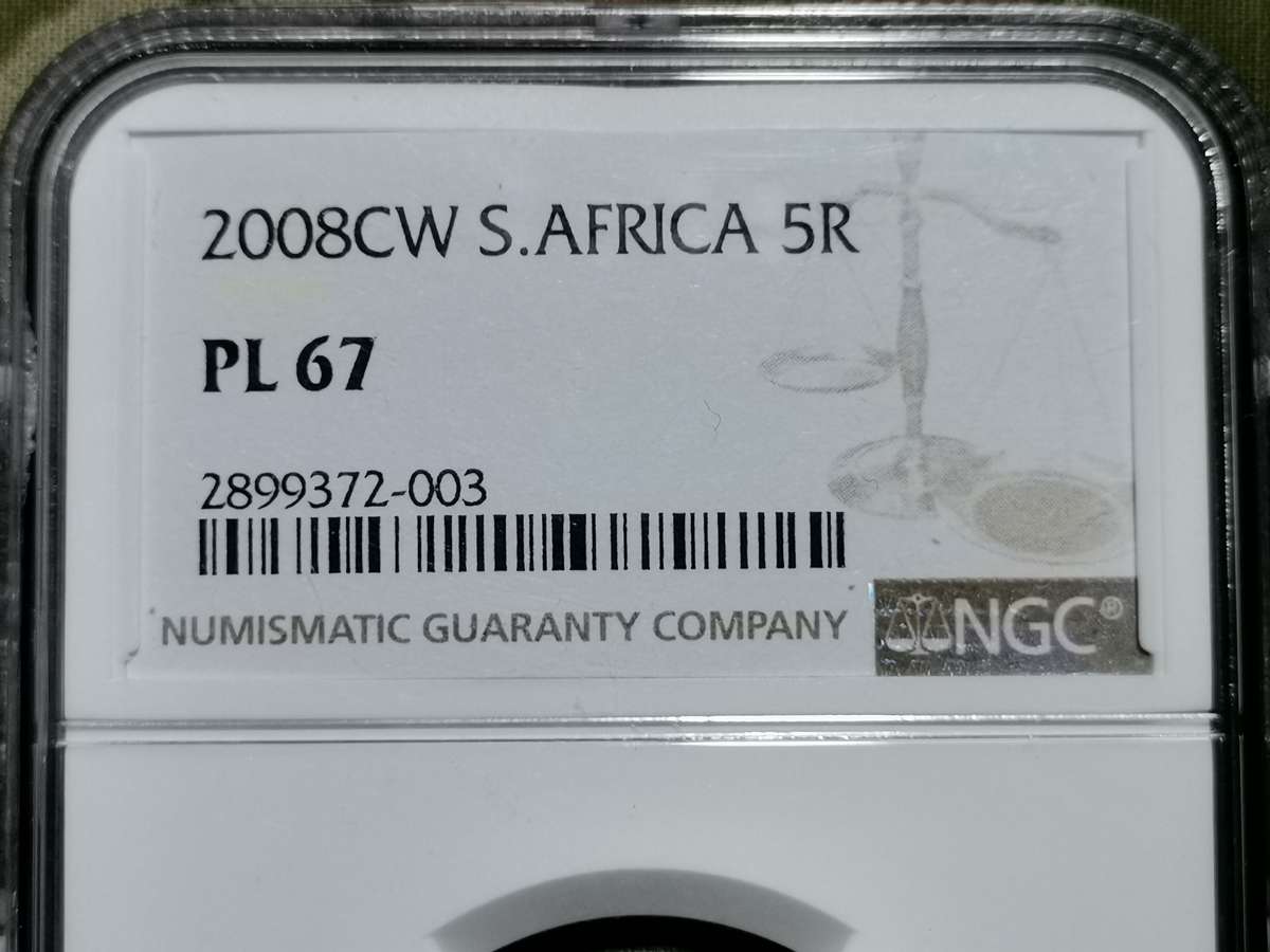 2008 COIN WORLD OOM PAUL MINT MARK. R5. NGC PL67.