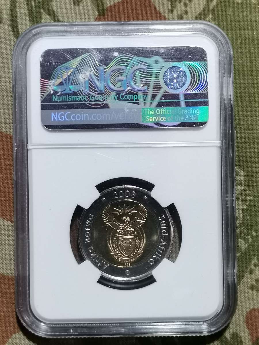 2008 COIN WORLD OOM PAUL MINT MARK. R5. NGC PL67.