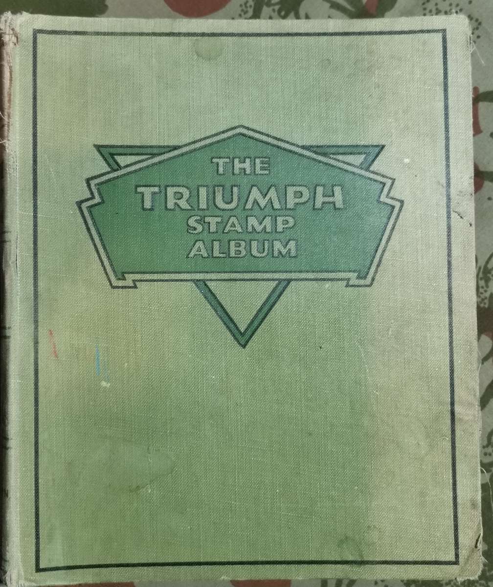 VINATGE POST WWII WORLD STAMP ALBUM WITH STAMPS.