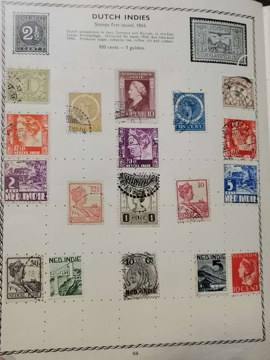 VINATGE POST WWII WORLD STAMP ALBUM WITH STAMPS.