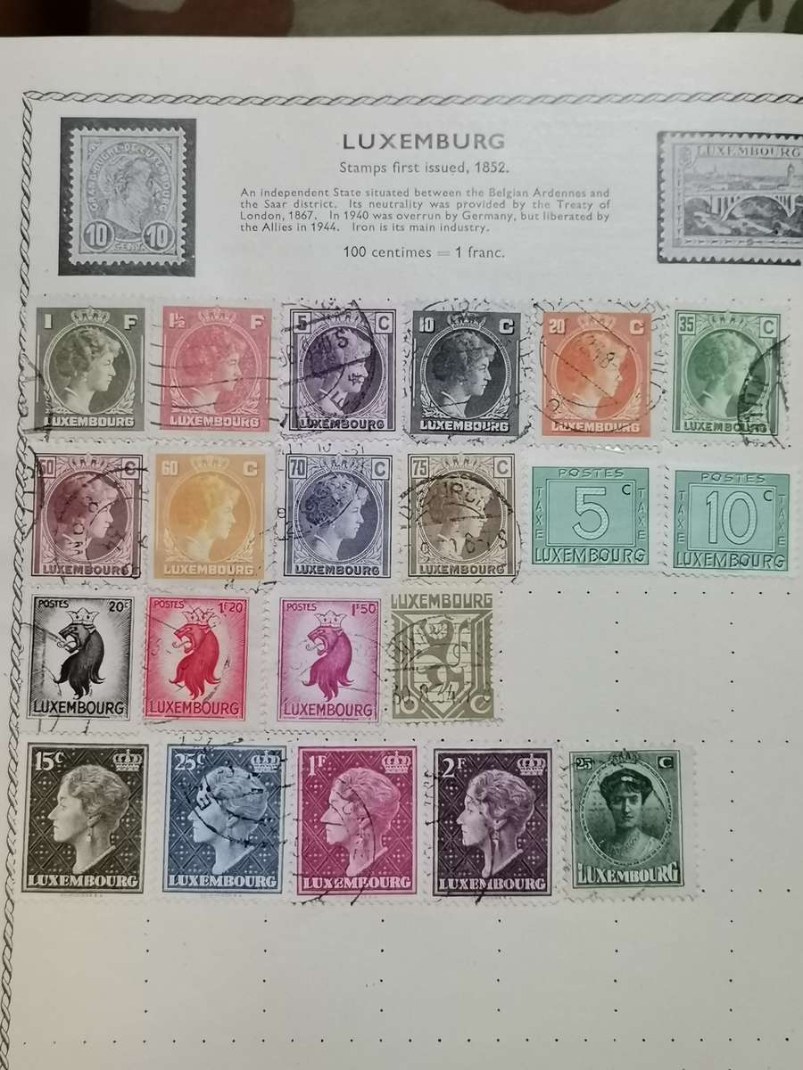 VINATGE POST WWII WORLD STAMP ALBUM WITH STAMPS.