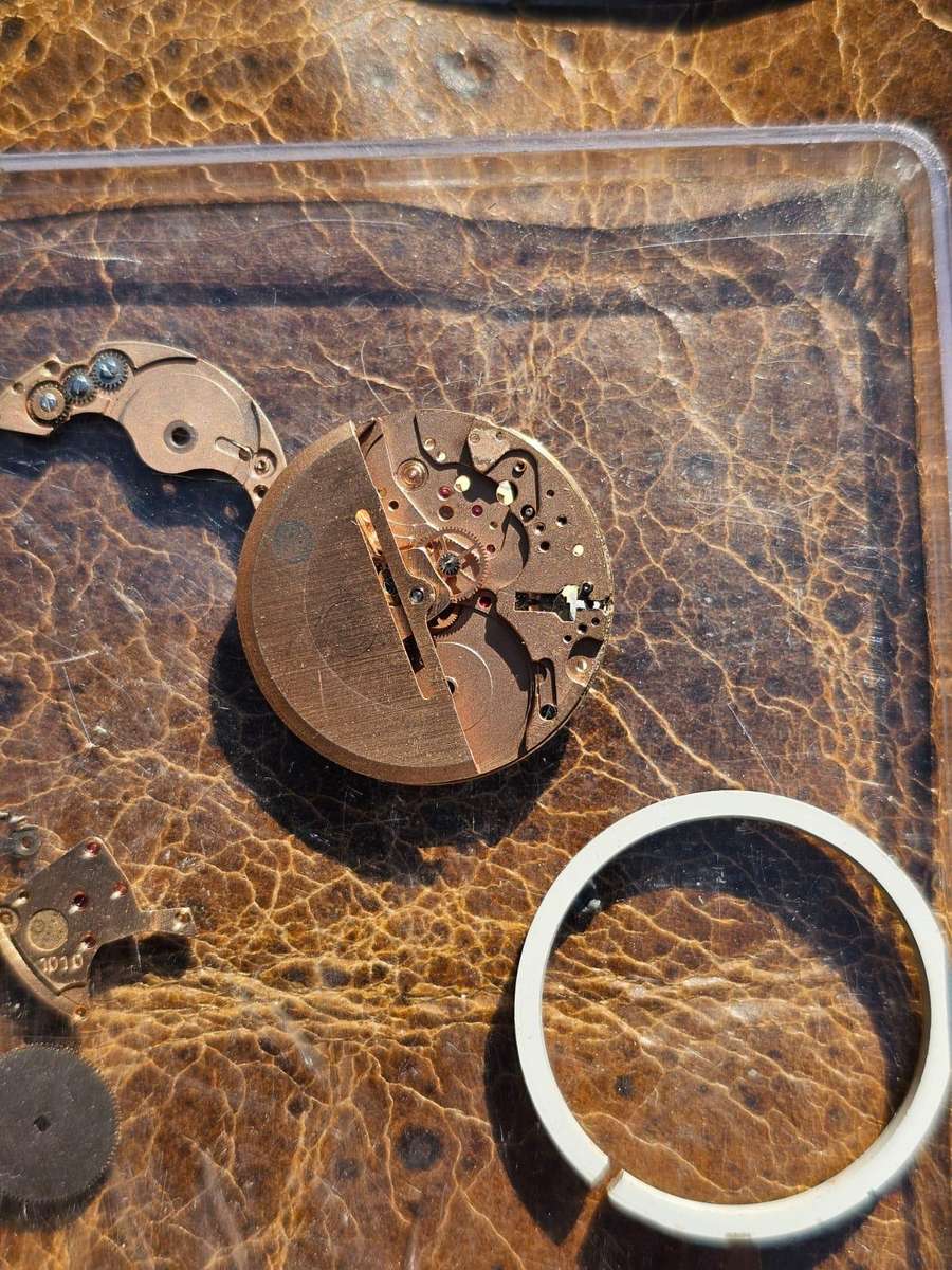 Omega Swiss Watch, cases, dials etc