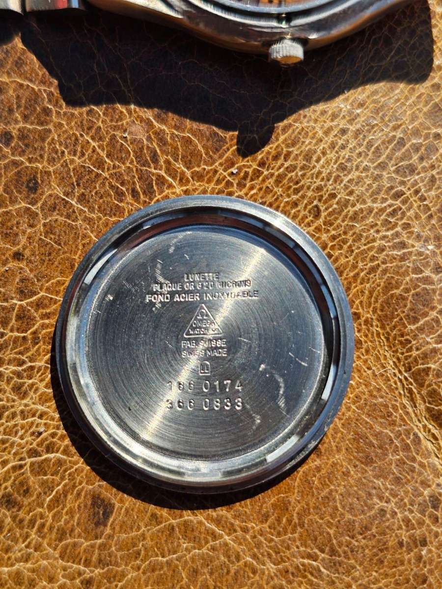 Omega Swiss Watch, cases, dials etc