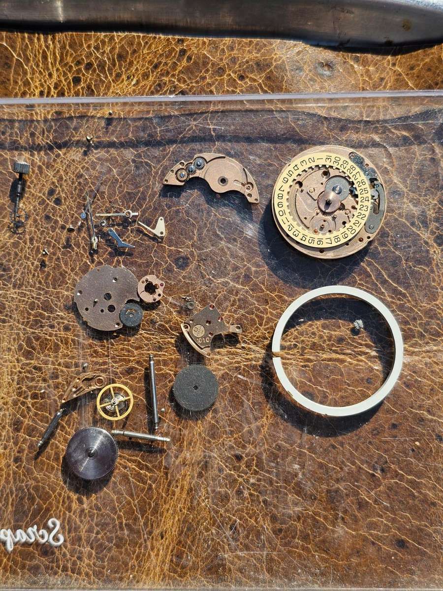 Omega Swiss Watch, cases, dials etc