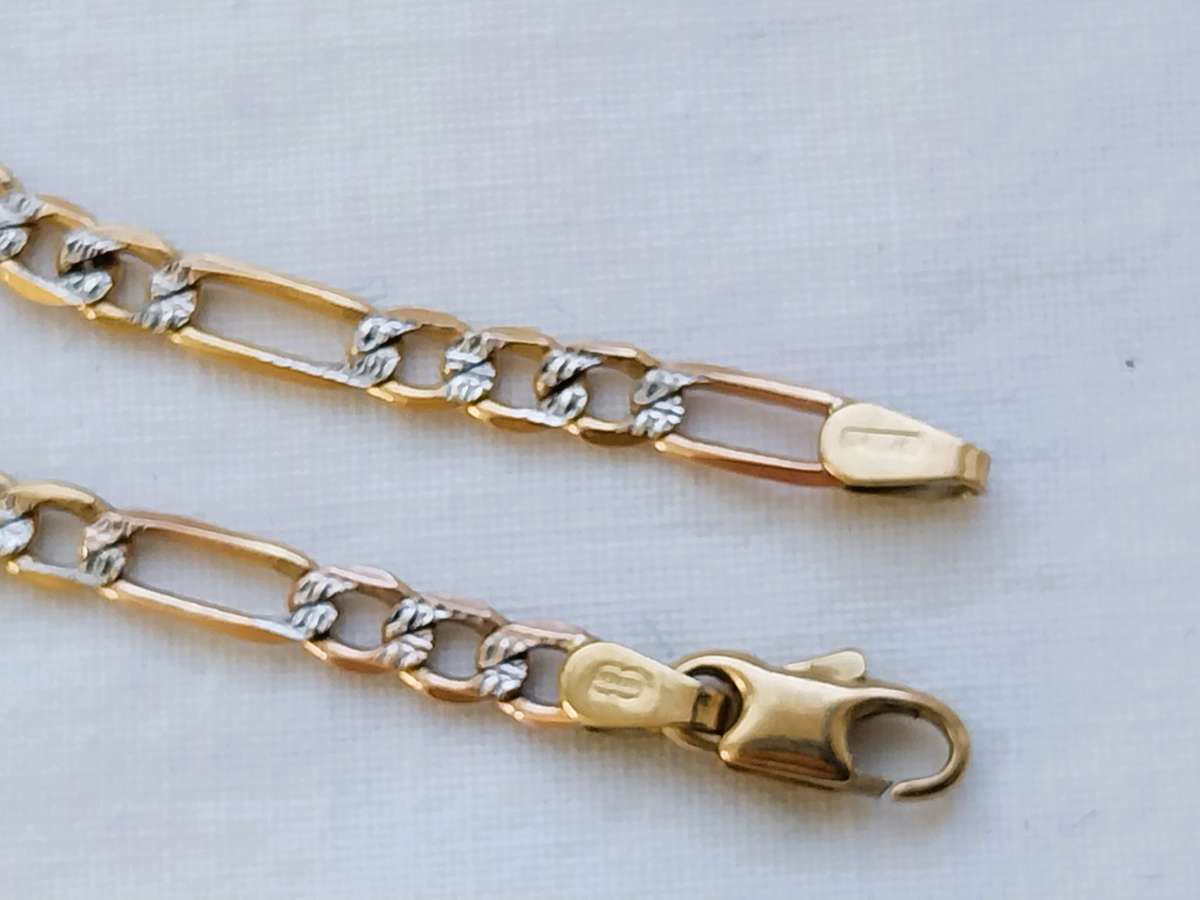 GENUINE 9 CT GOLD FIGARO-LINK BRACELET.