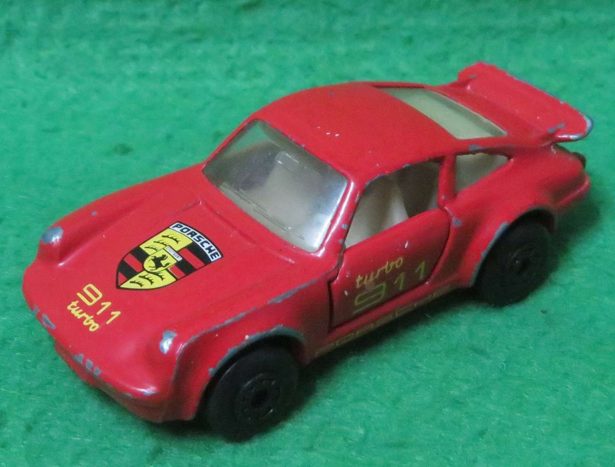 Matchbox Toys Ltd**Porsche 911 Turbo**Made in Macau**1978**Metal base**Doors open**
