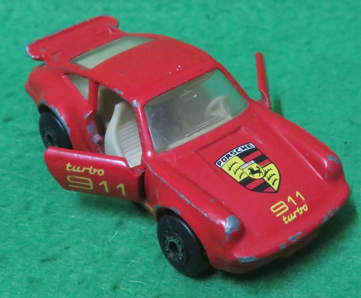 Matchbox Toys Ltd**Porsche 911 Turbo**Made in Macau**1978**Metal base**Doors open**