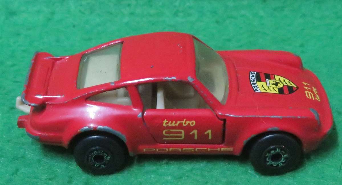 Matchbox Toys Ltd**Porsche 911 Turbo**Made in Macau**1978**Metal base**Doors open**