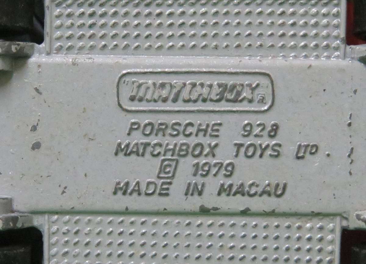Matchbox Toys Ltd**Porsche 928**Made in Macau**1979**Metal base**Doors open**
