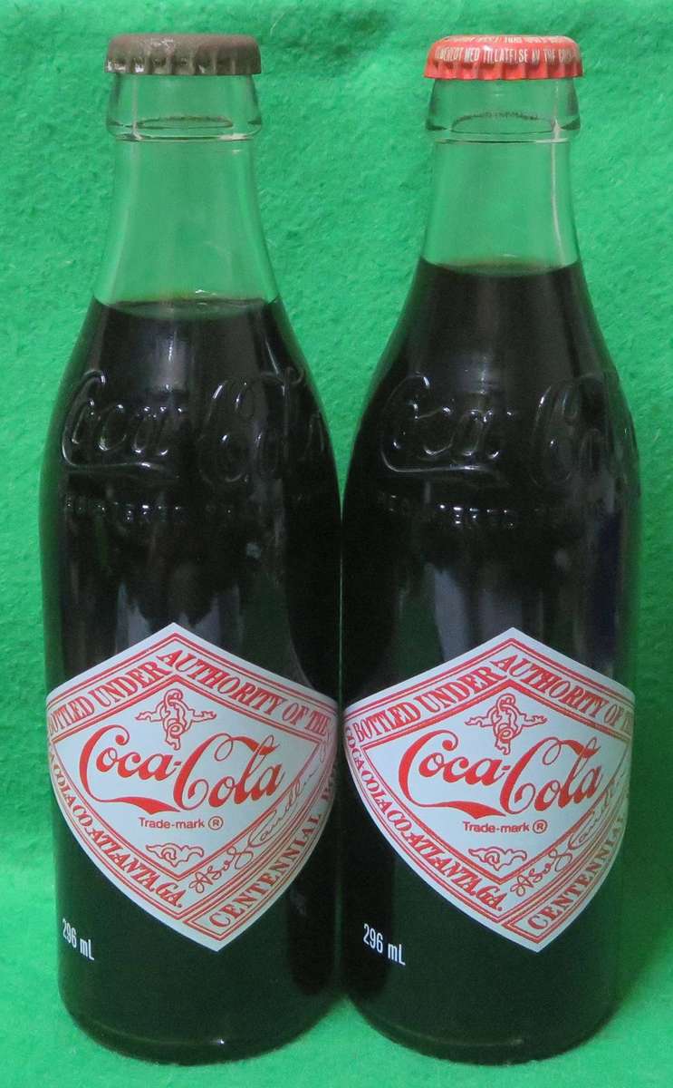 **Coca-Cola**2 x 1986 100th Anniversary Commemorative Coke Bottles**