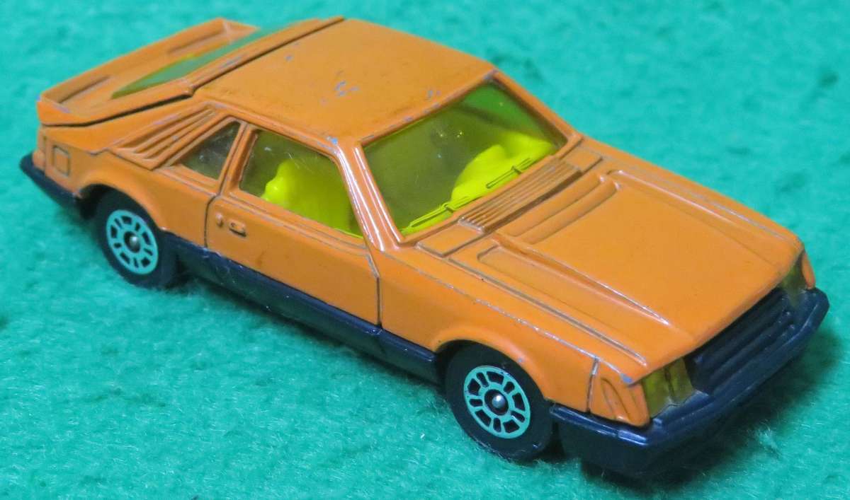 Vintage**Corgi**Ford Mustang Cobra**With original box**Made in GB**1981**Opening Boot lid**