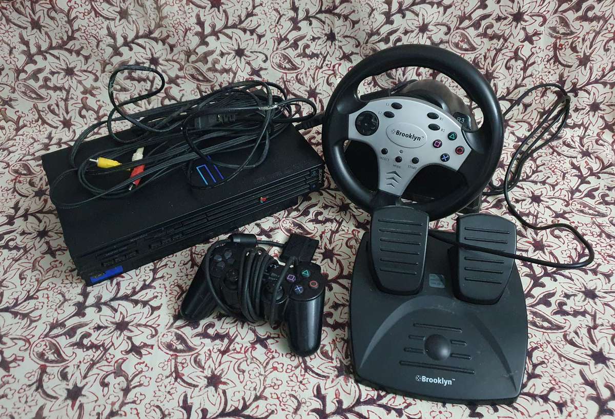 PS2 Console with Controller, Racing Streering Wheel & Peddles