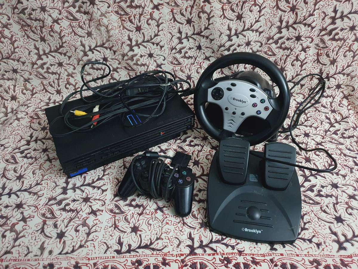 Playstation 2 Bundle with 1x Controller 1x Steering Wheel & Pedals ( All Wires )  All Turns on