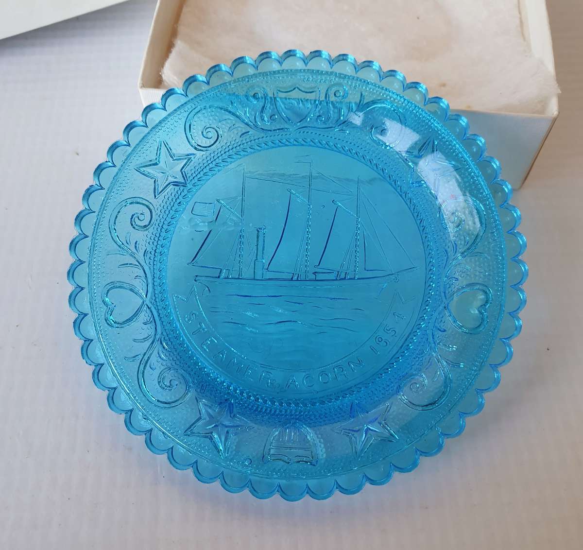 Streamer Acorn 1854 Boat Display on Blue Glass from Sandwich Glass Museum