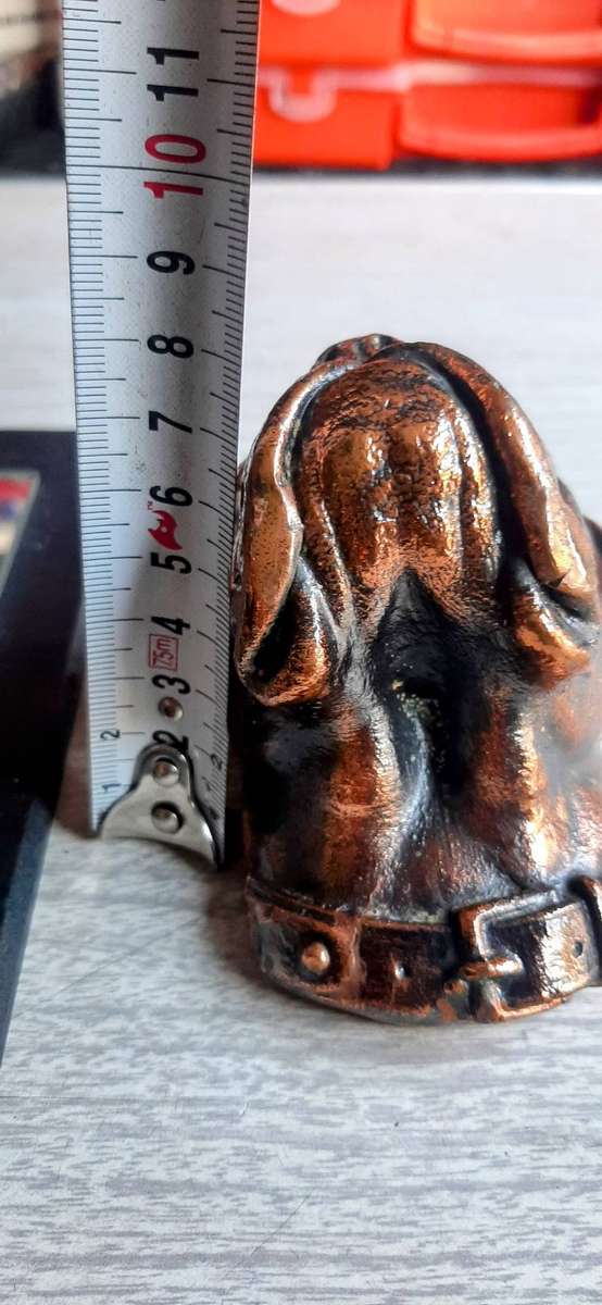 Copper plated boxer dog face with mirror of a boxer.