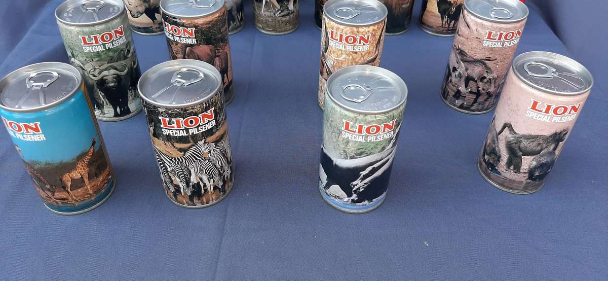 Vintage lion beer and bar memorabilia of South africa animals with beer inside.Full with glasses.