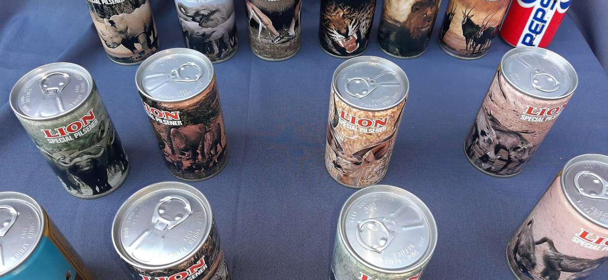 Vintage lion beer and bar memorabilia of South africa animals with beer inside.Full with glasses.
