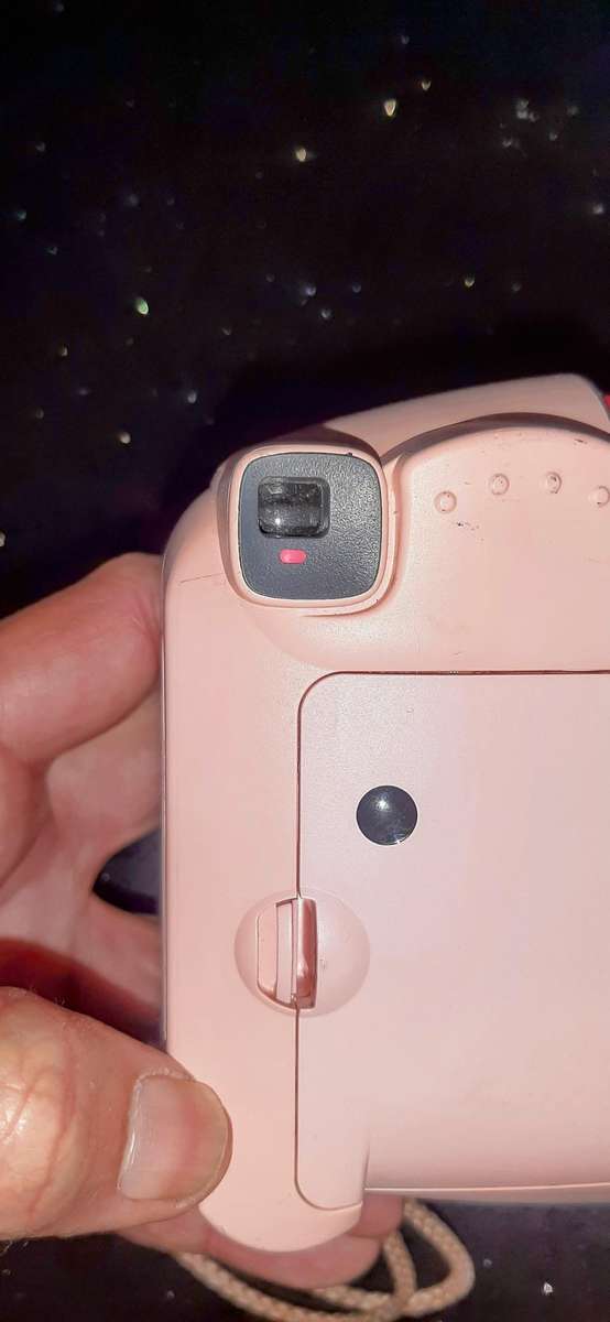 Pink polaroid Instax mini 8 camera.Auto adjust.