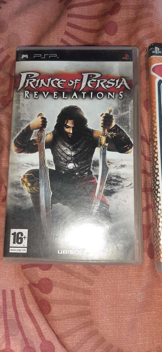 Two psp handheld games.Prince of Persia and Marvel superhero squad.