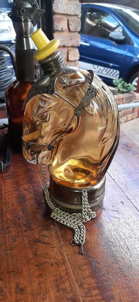 Vintage amber horse head musical liqueur bottle.Musical working.Just the bottle.