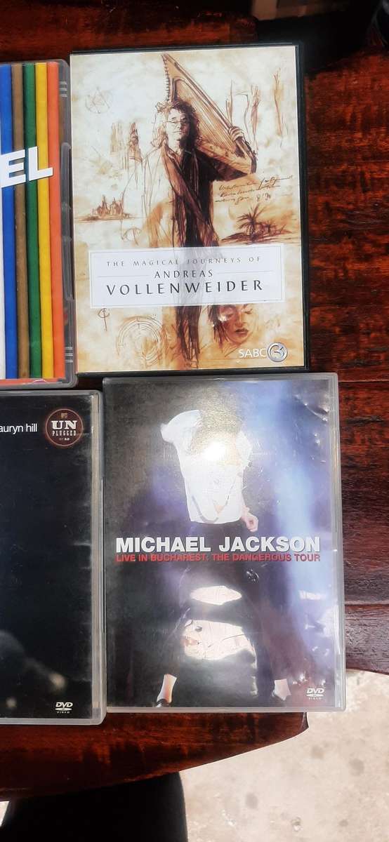 Selection of 10 musical dvd cd's various artist.Look at pics.