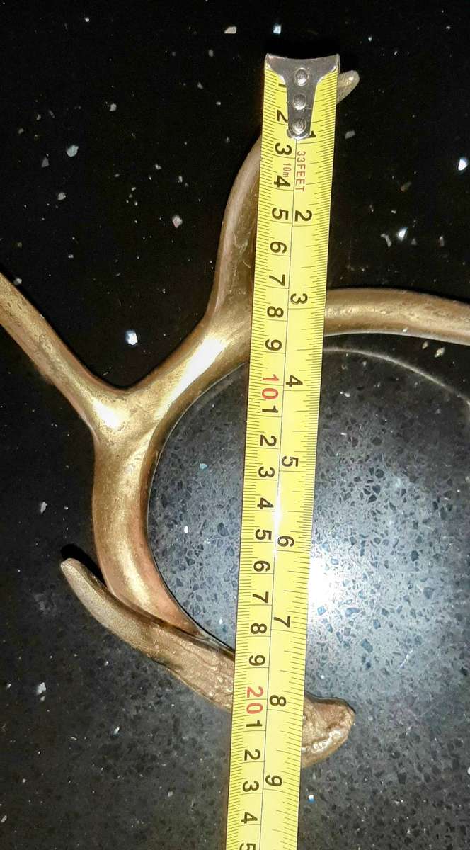 Pair of aluminum brass plated andlers.