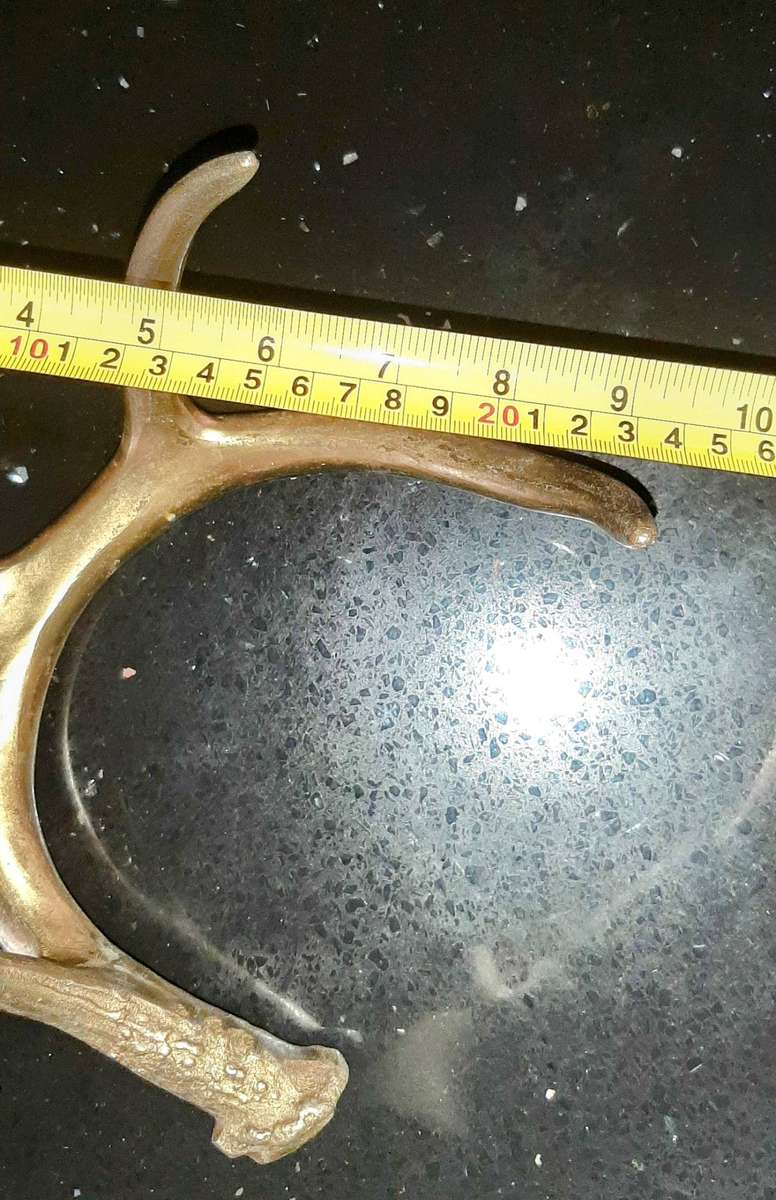 Pair of aluminum brass plated andlers.