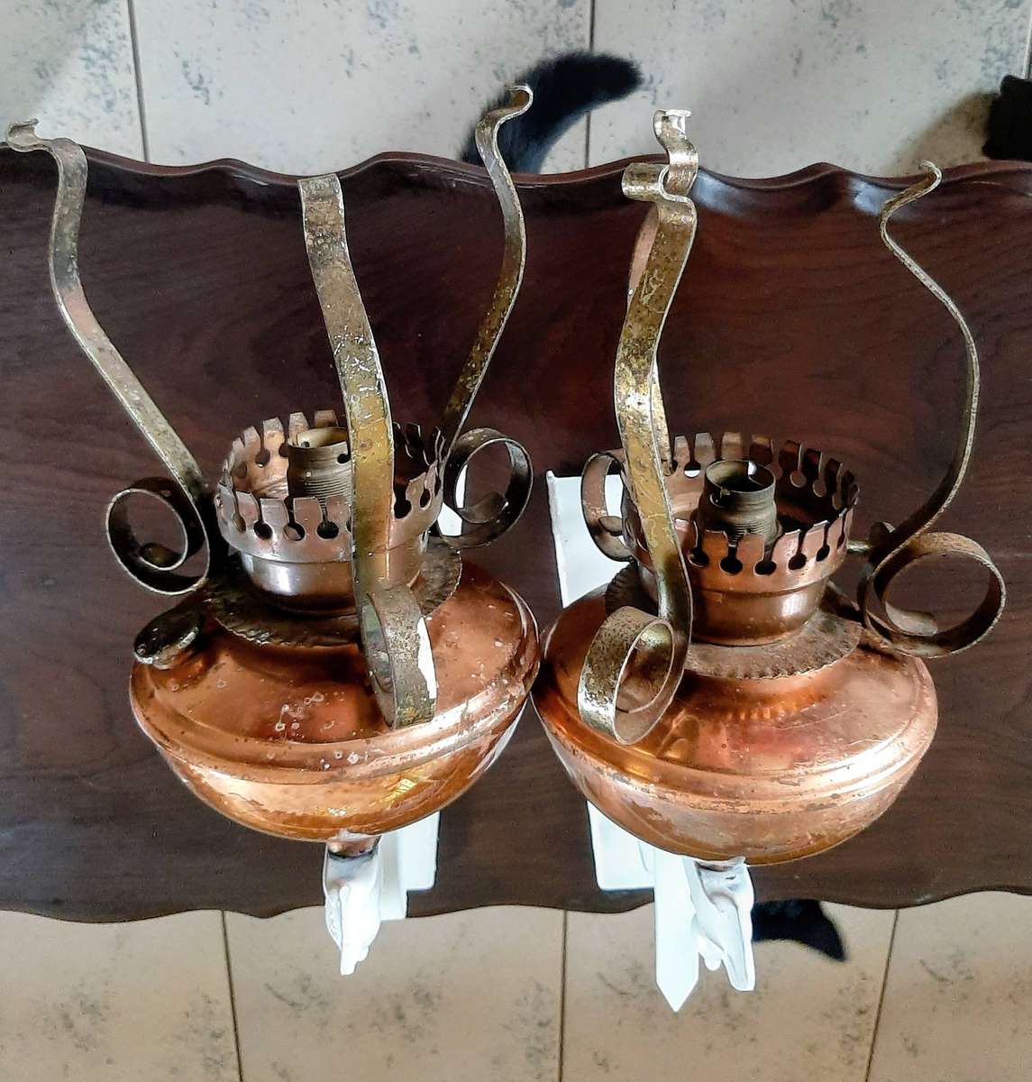 Vintage scone copper oil lamps converted to electric.