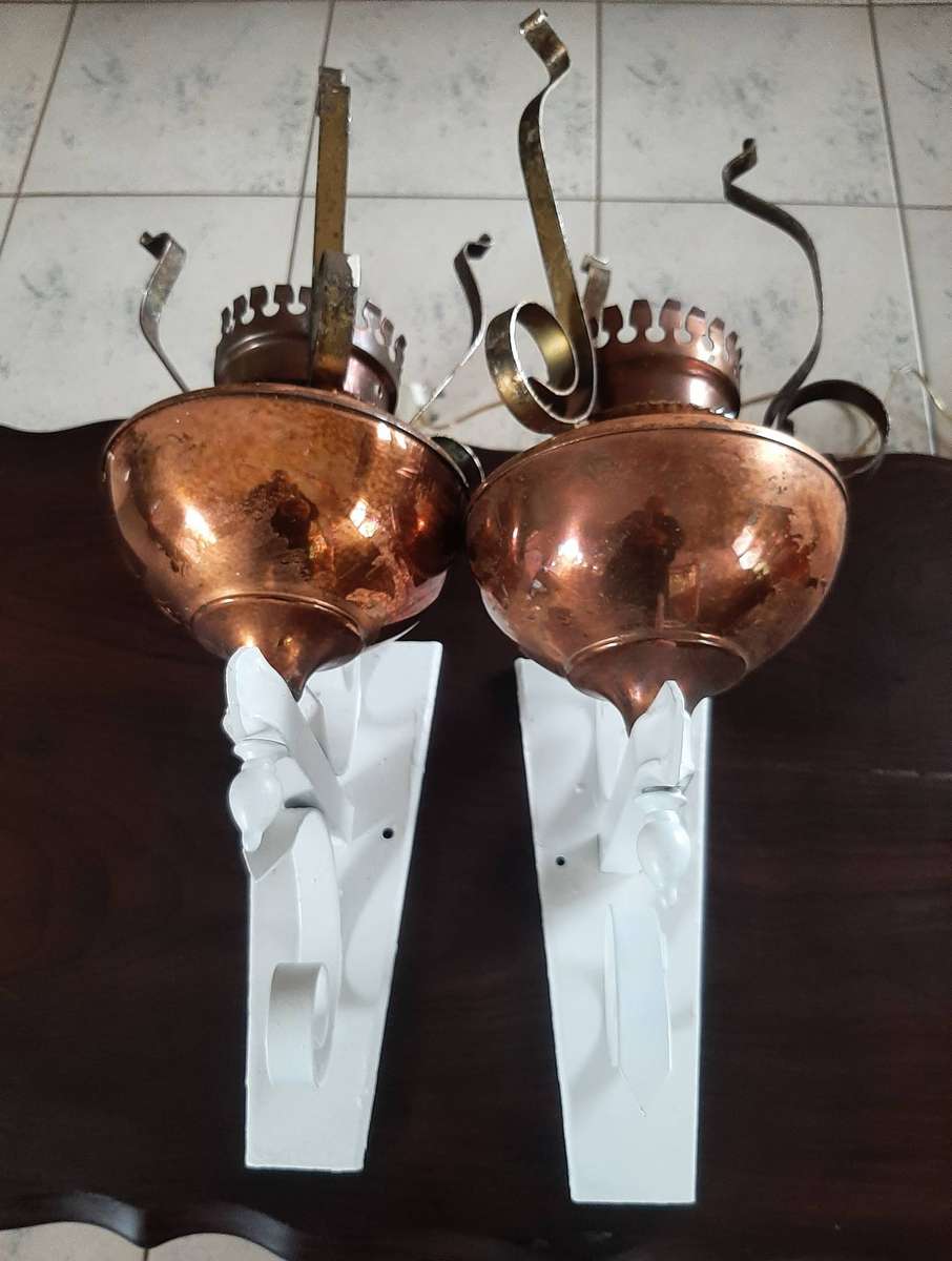 Vintage scone copper oil lamps converted to electric.