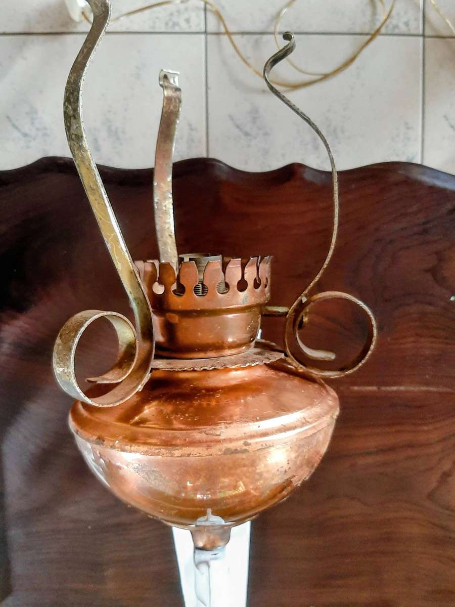 Vintage scone copper oil lamps converted to electric.