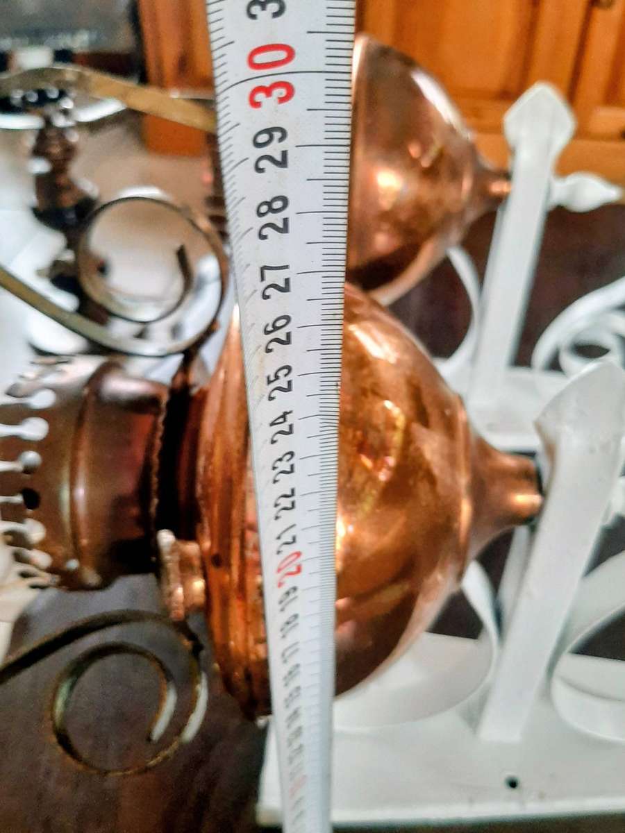 Vintage scone copper oil lamps converted to electric.