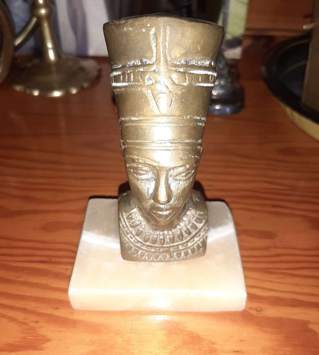 Vintage brass bust of Queen Nefertiti.