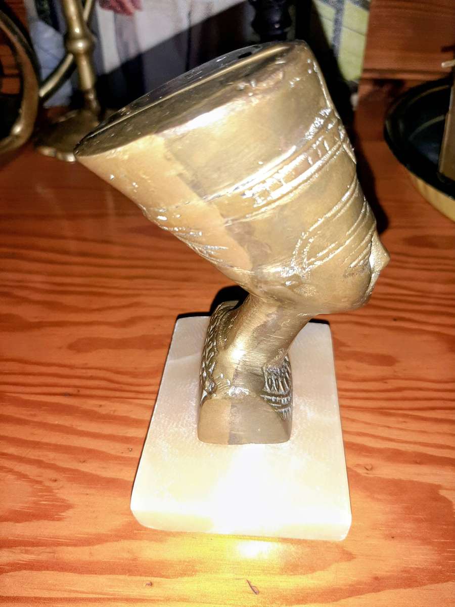 Vintage brass bust of Queen Nefertiti.