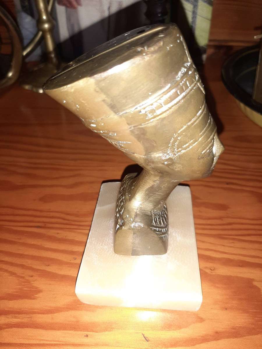 Vintage brass bust of Queen Nefertiti.