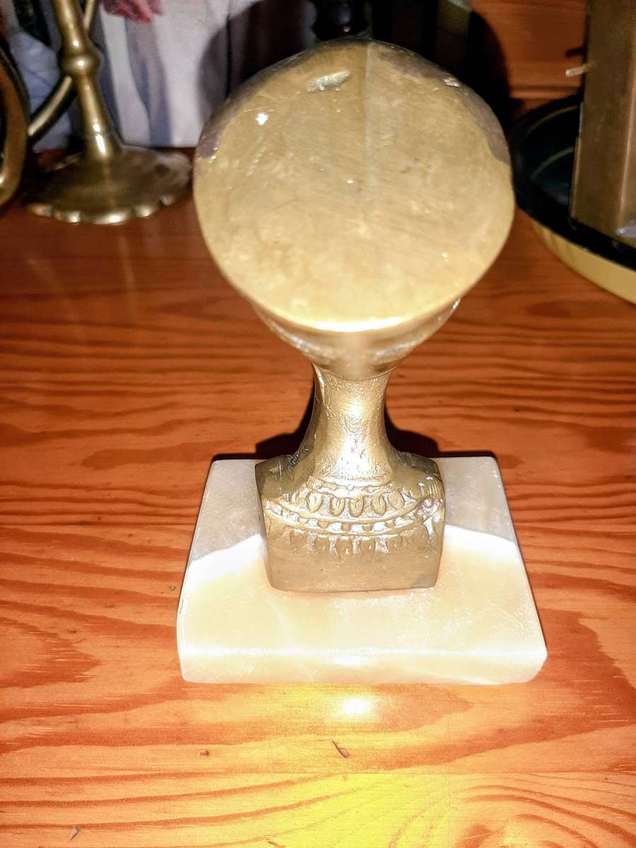 Vintage brass bust of Queen Nefertiti.