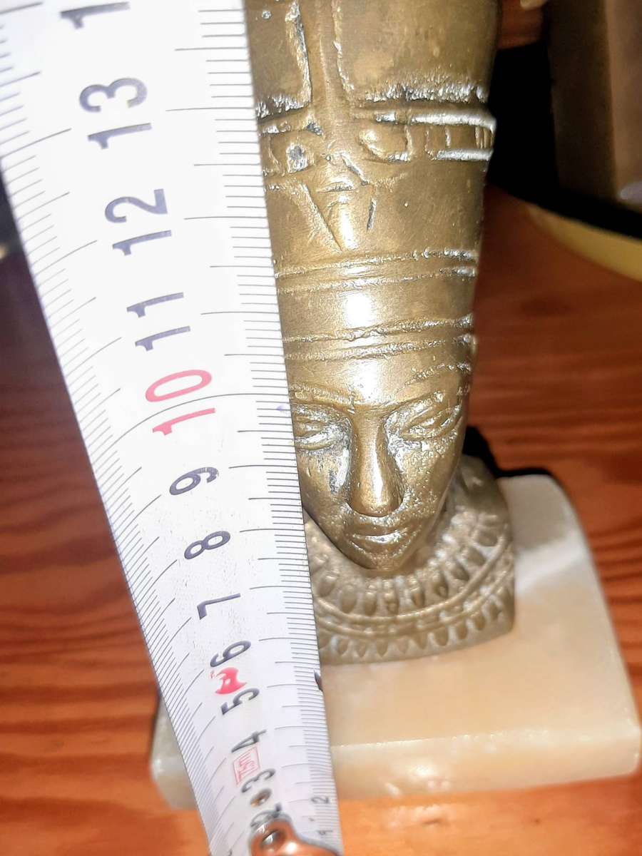 Vintage brass bust of Queen Nefertiti.