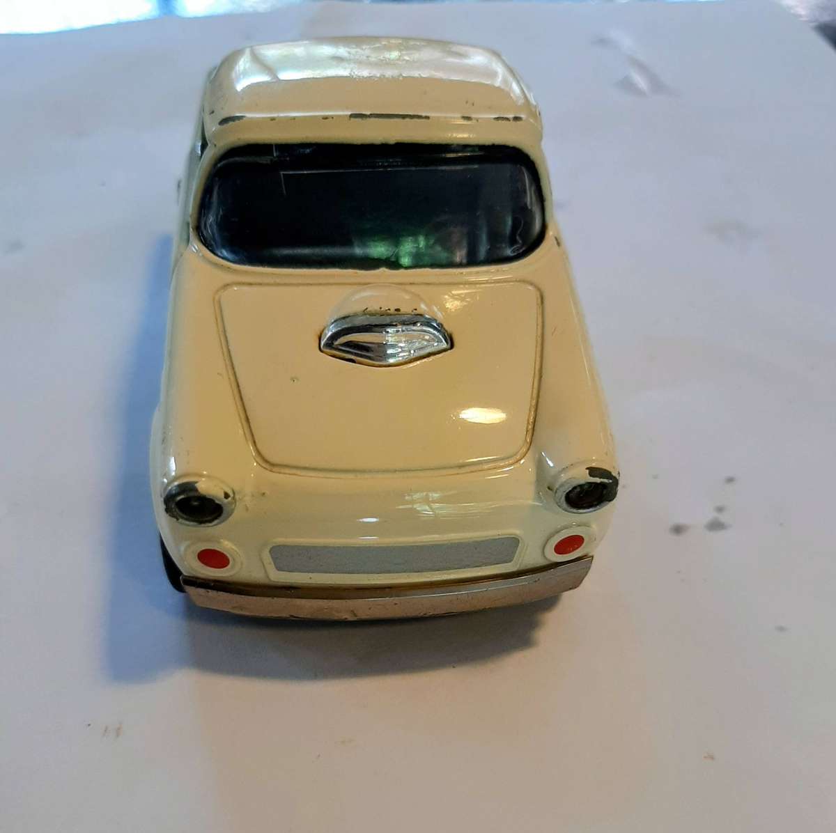 Vintage die-cast model of a 1955 Ford Thunderbird. This model is a replica.