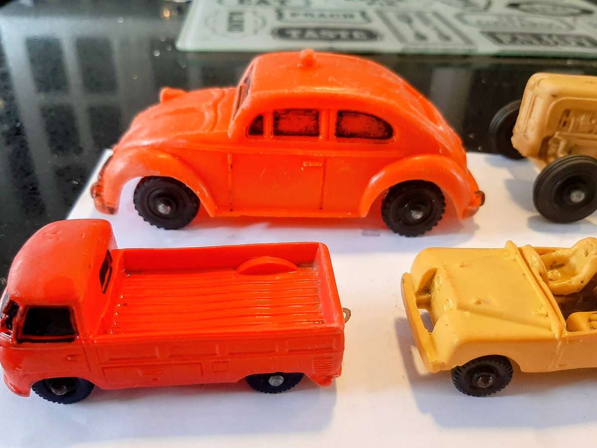 Vintage rubber toy cars, likely from the Norwegian brand Tomte Laerdal.