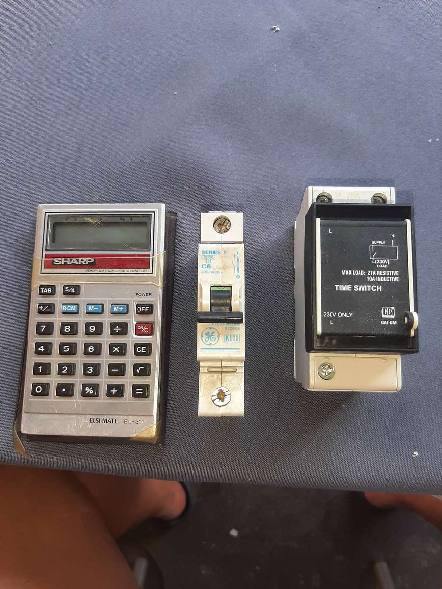 Electronics,calculator,timer switch,suircat breakerSelling as is..