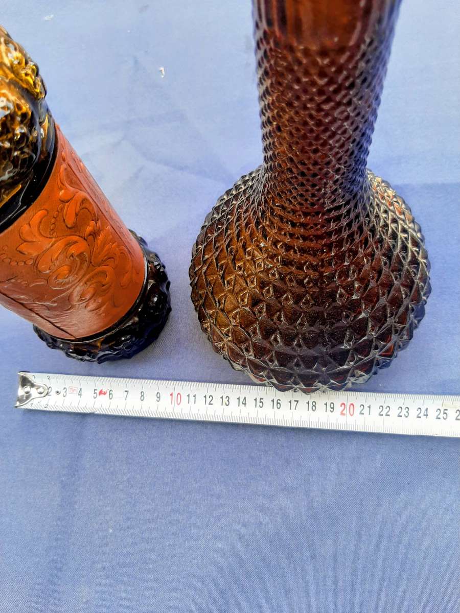 Vintage empoli decantor and liquor bottle wrapped in leather.r