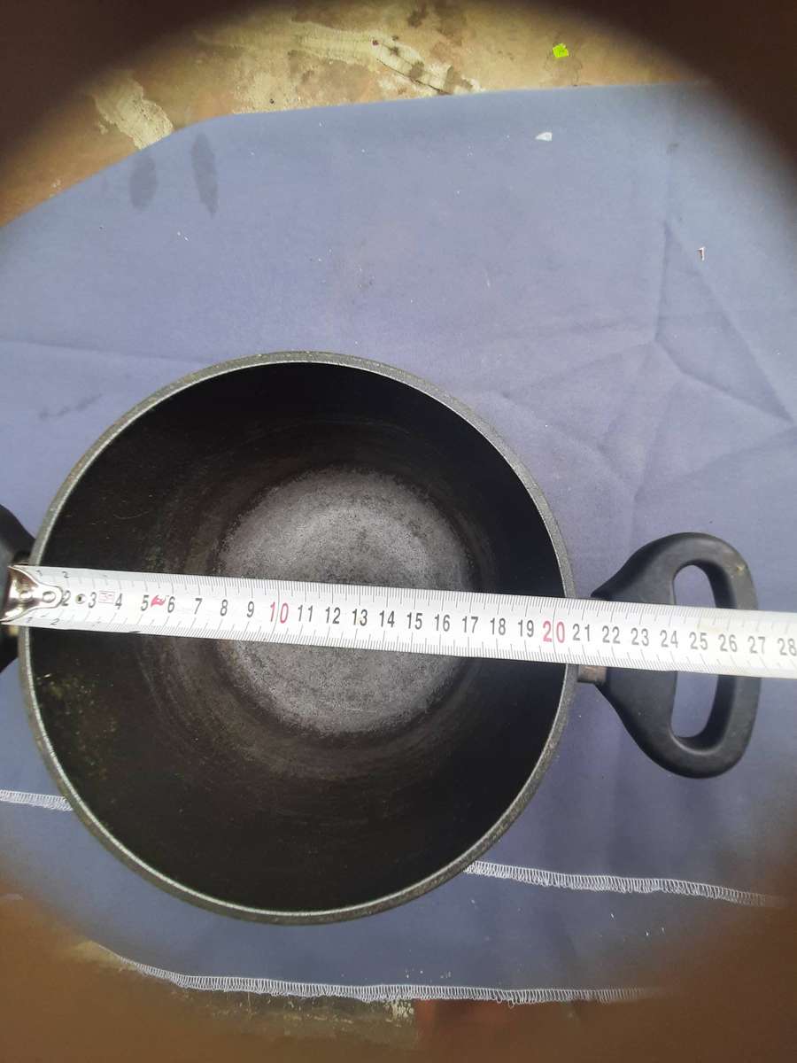 Woll Titanium Nowo Induction Pot. It is a cast aluminum pot with a non-stick titanium alloy coating.