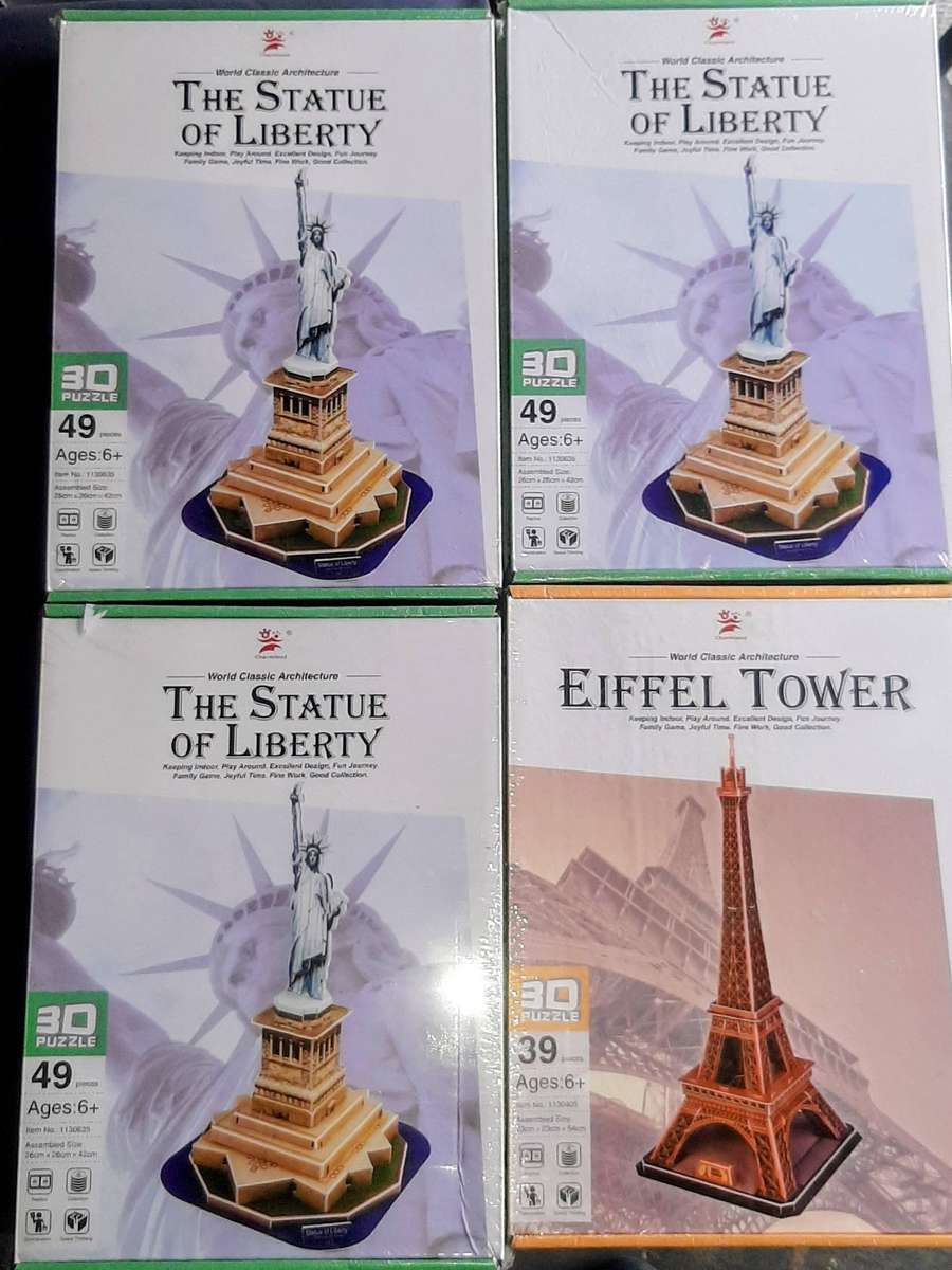 3D puzzles of famous landmarks, including the Statue of Liberty and the Eiffel Tower. These are manu