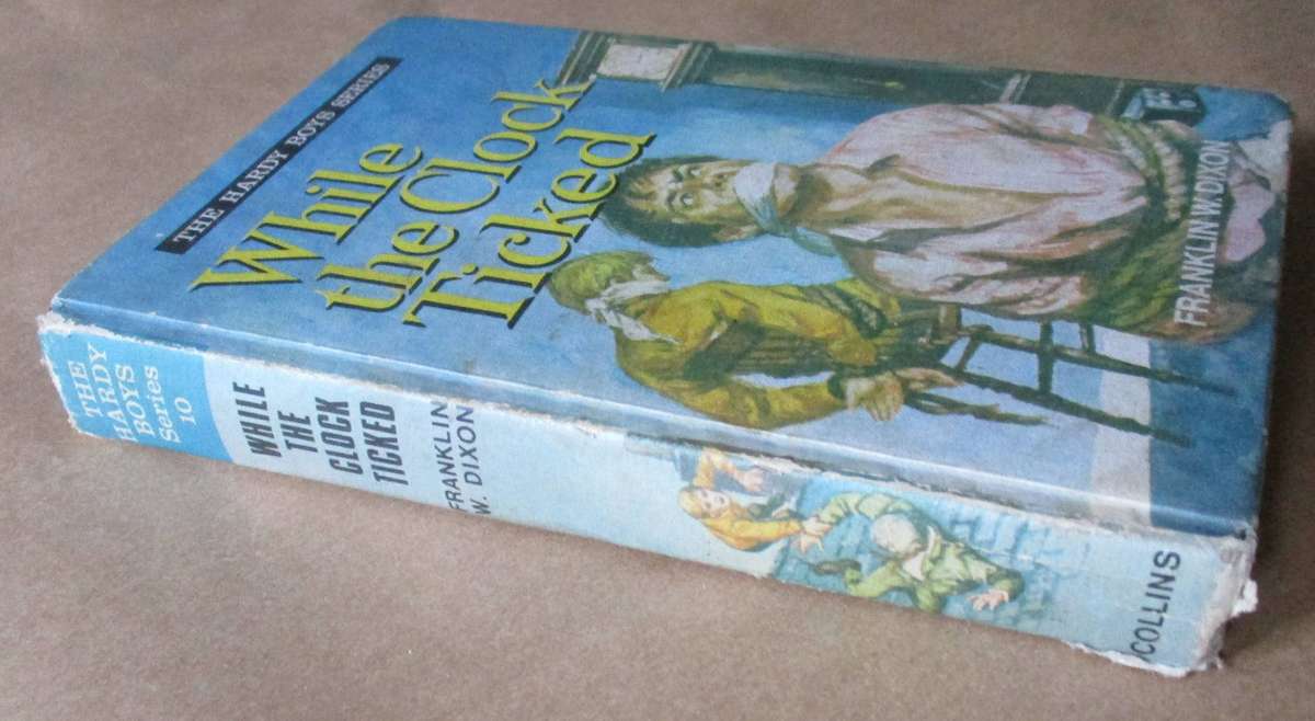 WHILE THE CLOCK TICKED - FRANKLIN W DIXON - THE HARDY BOYS