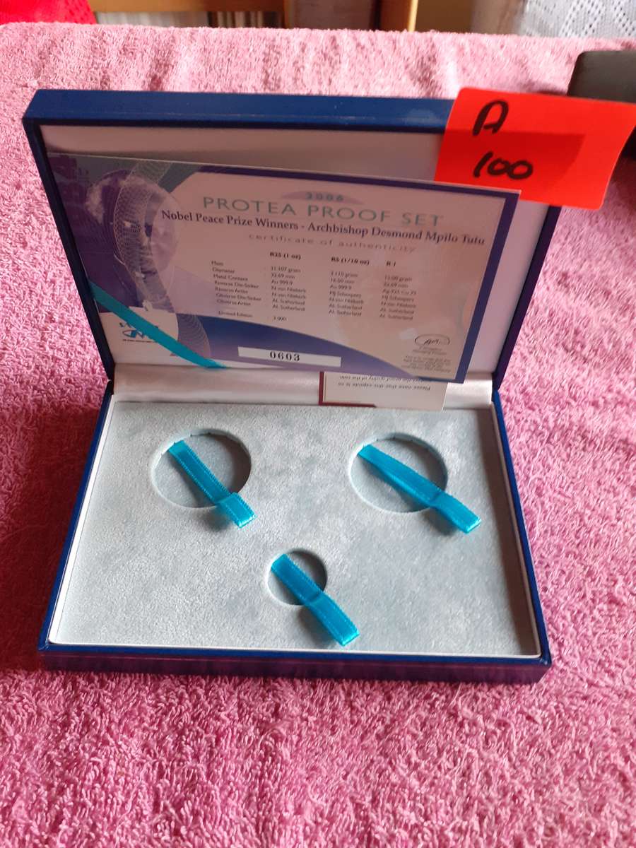 Empty Blue Coin Holder Box. Nobel Peace Prize Winners - Archbishop Desmond Mpilo Tutu