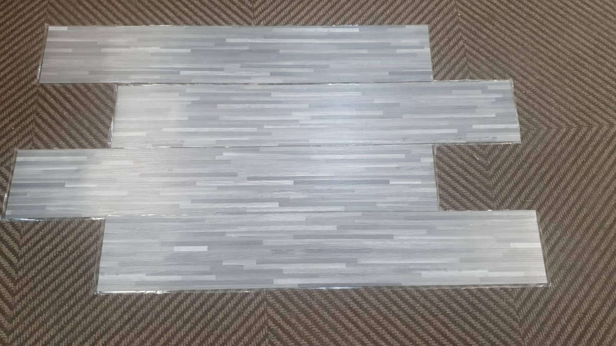Grey Wood grain floor tile. Vinyl peel and stick 5sqm