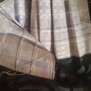 Black taffeta curtain with swirl pattern