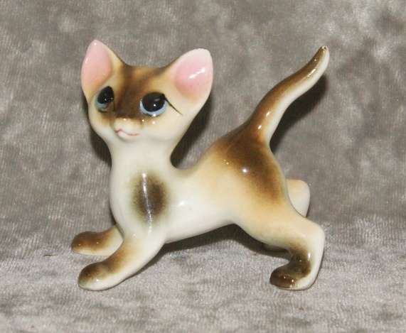 Vintage porcelain Siamese cat figurine