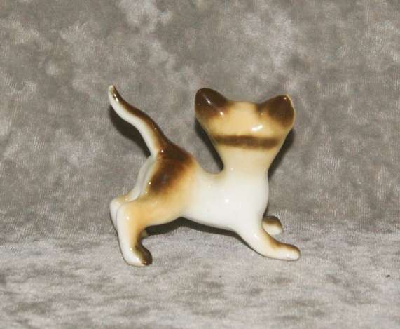 Vintage porcelain Siamese cat figurine